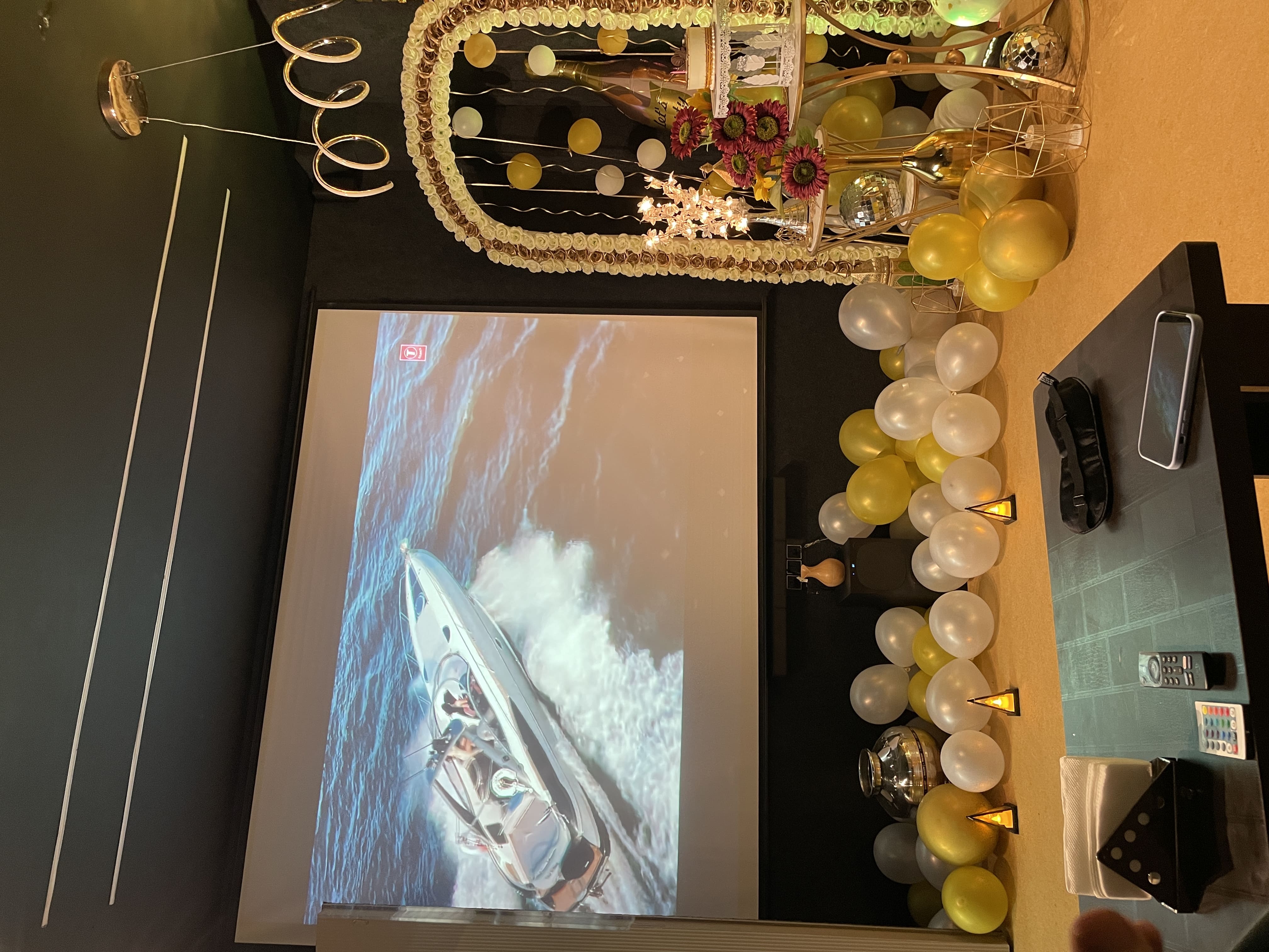 Group of friends enjoying a party with drinks and food